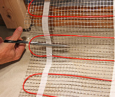 Cut the mat's mesh backing to make a turn.